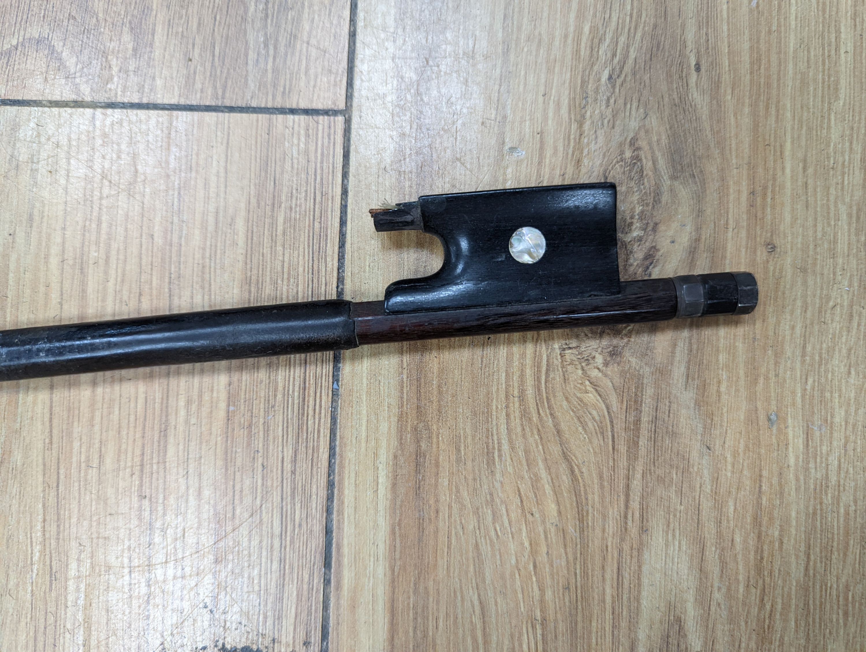 A violin and bow, various records etc